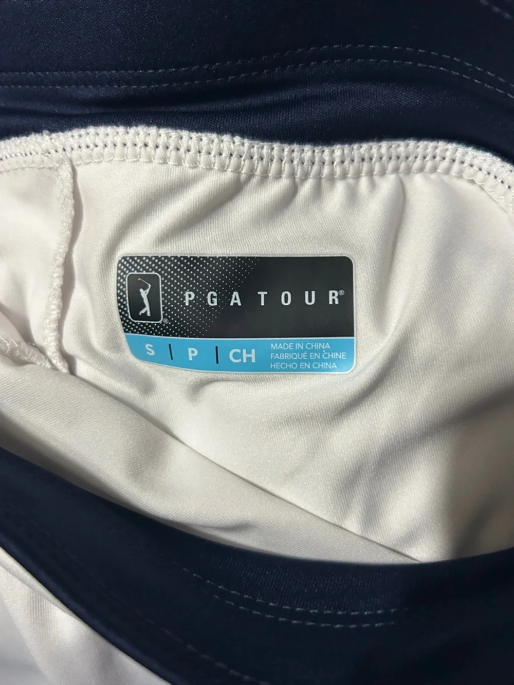 PGA Tour White Active Skort with Navy Waistband and Geometric Accent